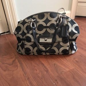 Black and grey Coach purse